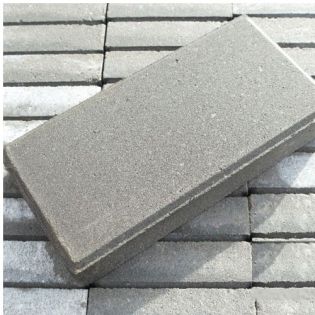 Halve betontegel KOMO Grijs met facet 15x30x4.5cm